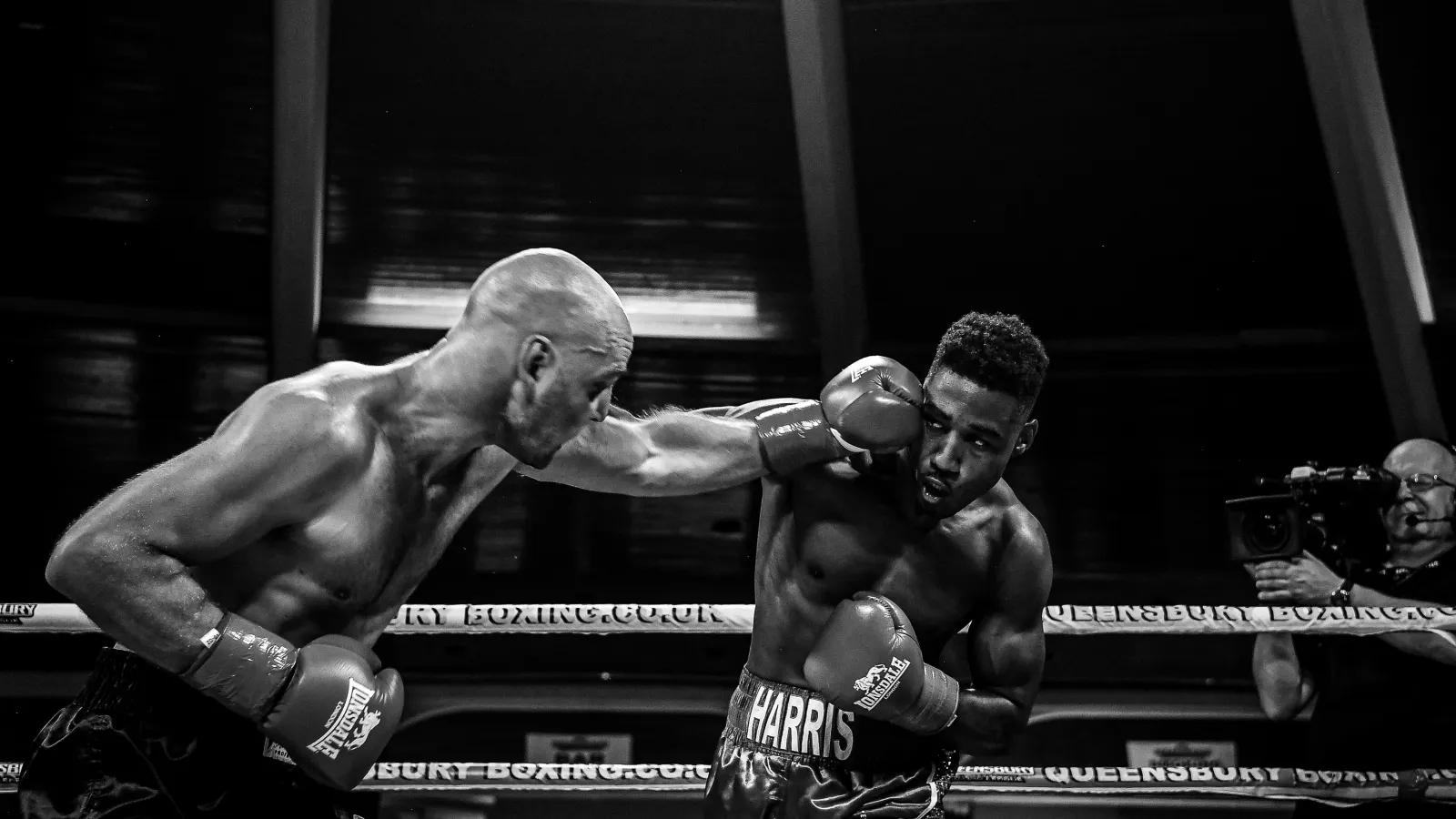 Boxer landing a jab, black and white